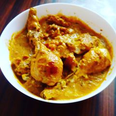 A picture of Butter chicken curry.