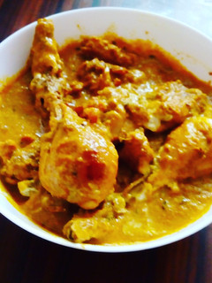 A picture of Butter chicken curry.
