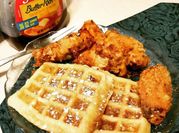 A picture of waffles with powdered sugar