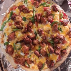 A picture of Super duper Yummy Pizza with a taste full of Deliciousness 🍕🍷.