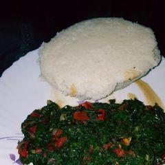 A picture of Fried Kales/sukumawiki(with tomatoes).