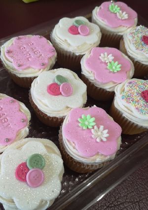 A picture of Vanilla cuppies with buttercream icing.