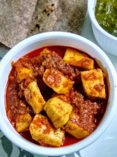 A picture of Paneer in Tomato Gravy.