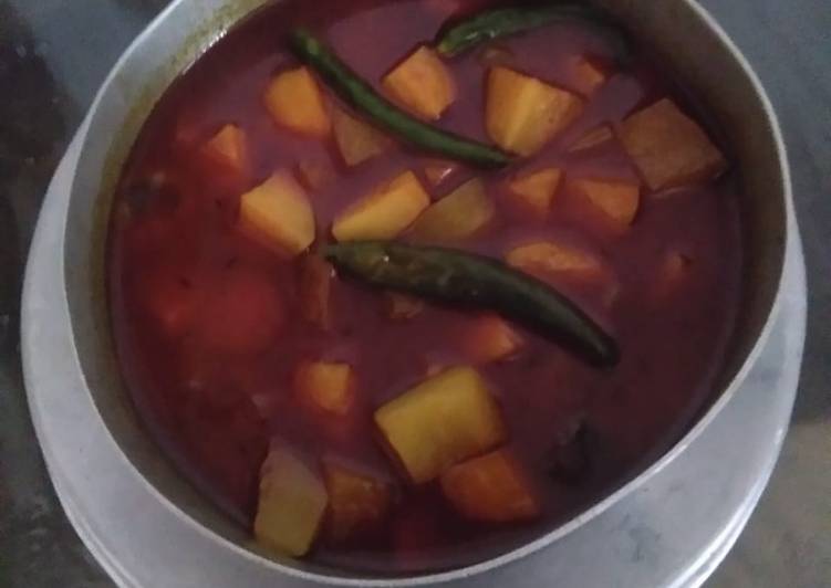 Raw papaya and potato curry