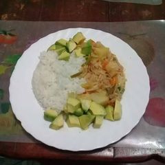 A picture of Steamed Rice, cabbage stew n Avocado. # Vegancontest#.