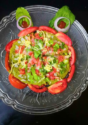A picture of Cheese Palak Pizza Dosa.