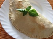 Una foto de pizza calzone