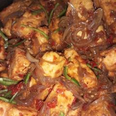 A picture of Tofu with pepper sauce.
