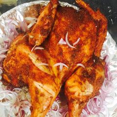 A picture of Spatchcock chicken (suya) yaji spice..