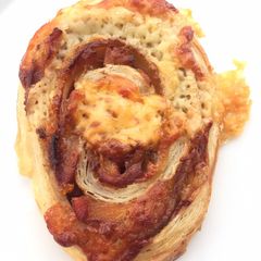 Roasted Pork With Korean Dried Persimmon Roll Top Passion Fruit Coulis A picture of Roasted Pork With Korean Dried Persimmon Roll Top Passion Fruit Coulis.