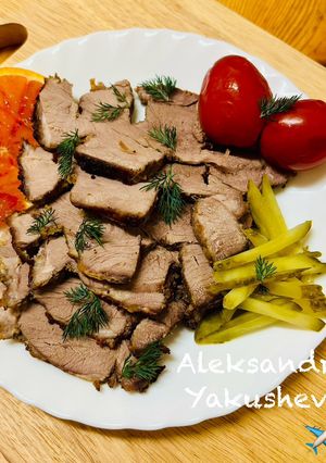 A picture of Leg of lamb baked with oranges.