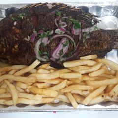 A picture of Whole fried fish & chips#Local Food Contest _Mombasa.