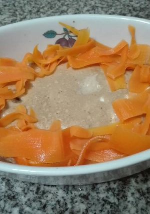 Una foto de Filet de merluza con queso blanco y salsa soja