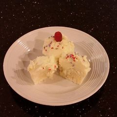 A picture of White Chocolate Truffle Cupcakes with Whipped White Chocolate Mascarpone Frosting.