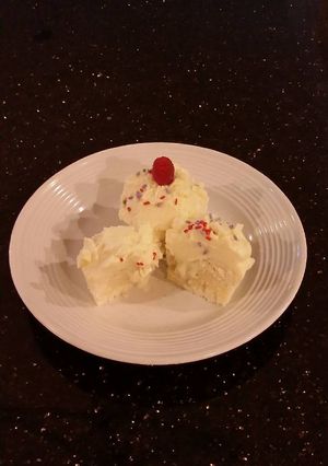 A picture of White Chocolate Truffle Cupcakes with Whipped White Chocolate Mascarpone Frosting.