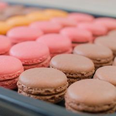 A picture of PARISIAN MACARONS (chocolate macarons).