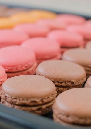 A picture of PARISIAN MACARONS (chocolate macarons).