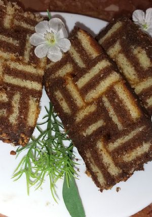Une photo de Gâteau au étages choco vanille