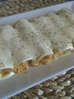 Una foto de Canelones de zanahoria y queso
