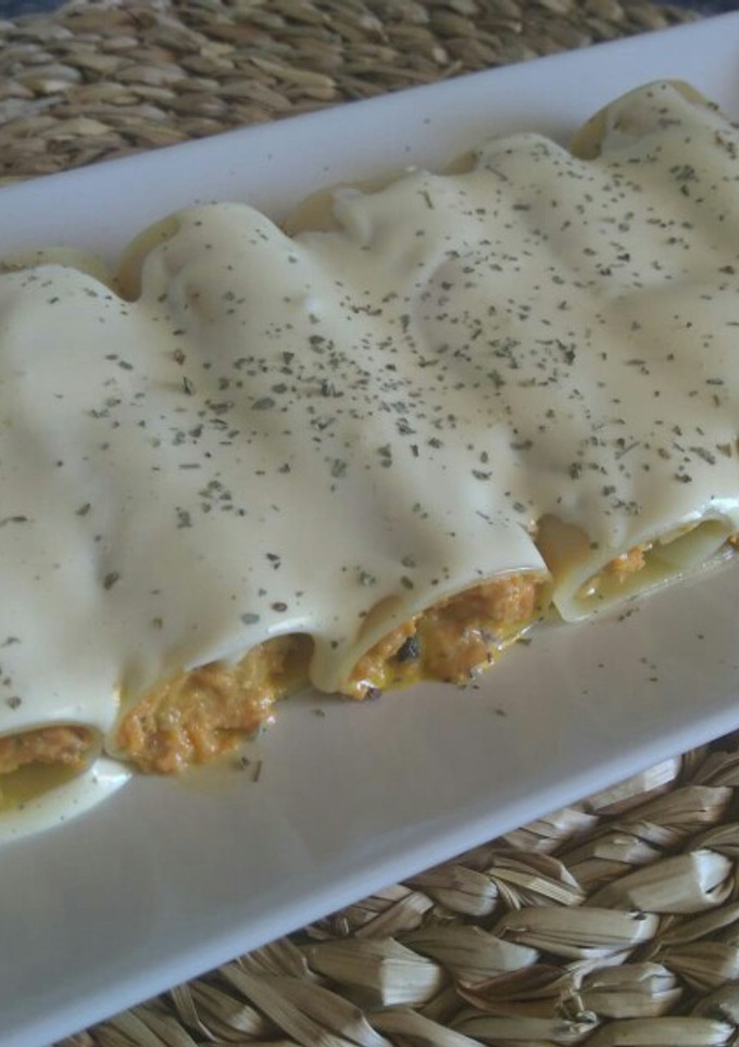 Una foto de Canelones de zanahoria y queso