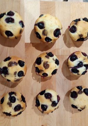 A picture of Blueberry muffin with yoghurt.