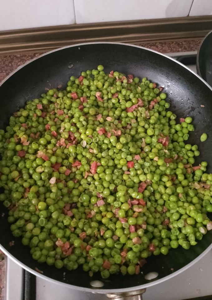 Una foto de Guisantes con jamón