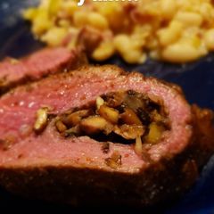 A picture of Mushroom, Garlic, and Onion Stuffed Venison Backstrap.