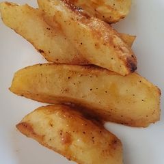 A picture of Baked potato wedges.