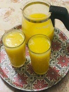 صورة لوصفة عصير البرتقال والكريفروت المنعش