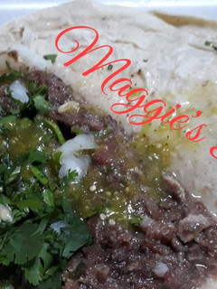 Una foto de Tacos de cabeza de res