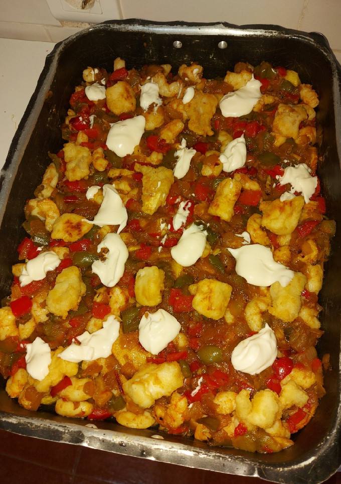 Una foto de Pastel de patatas con langostinos