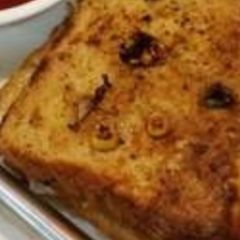 A picture of Folded Stuffed Bread with Coating.