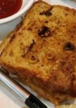 A picture of Folded Stuffed Bread with Coating.
