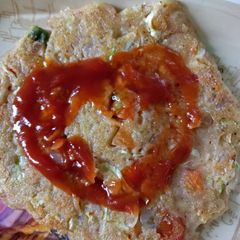 A picture of Sooji veg uttapam.
