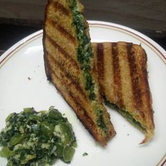 A picture of Spinach Capsicum cheese Sandwich (brown bread) (jain/regular).
