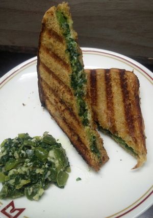 A picture of Spinach Capsicum cheese Sandwich (brown bread) (jain/regular).