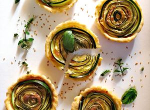 Foto di Crostatine salate alle zucchine