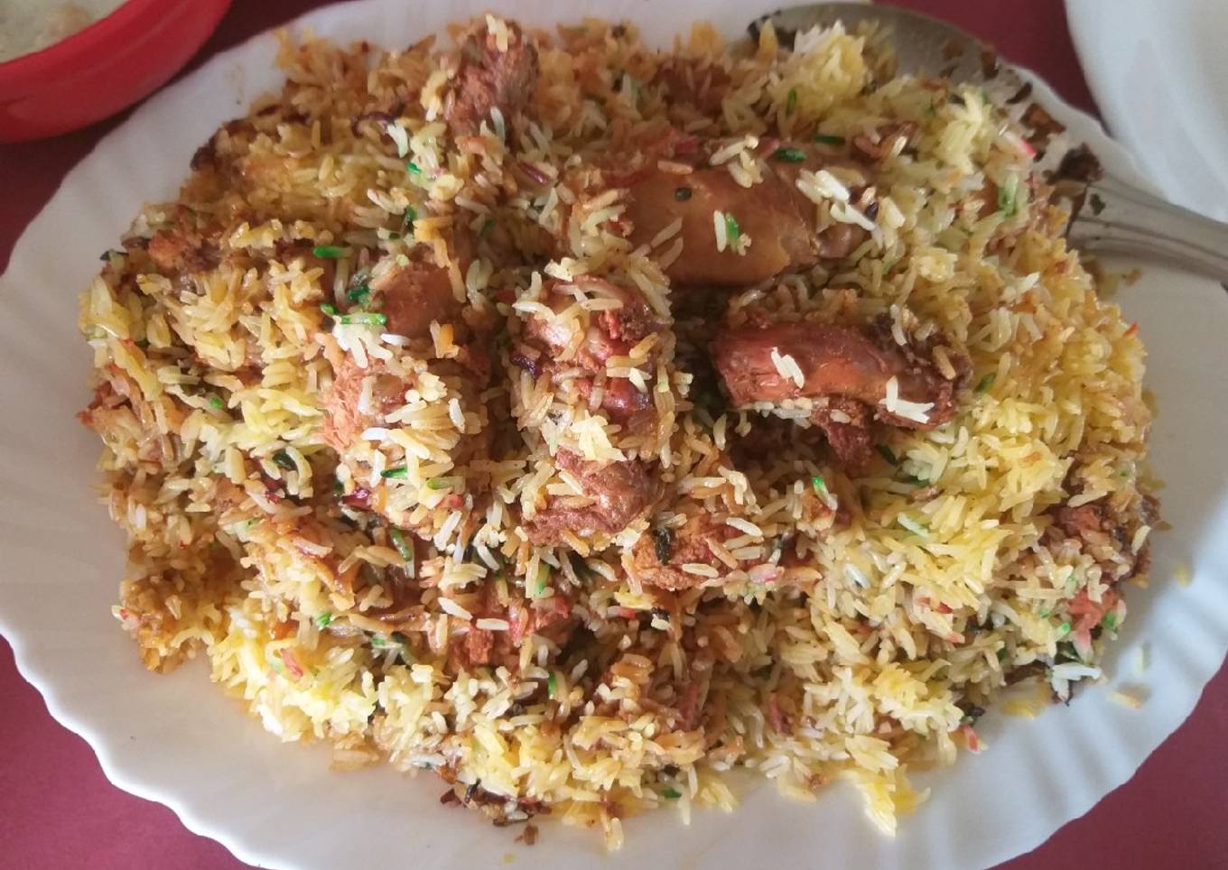 Chicken tikka biryani with boondi raita