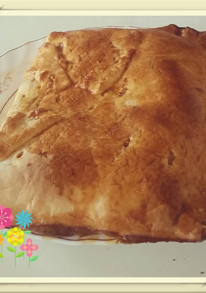 Una foto de Empanada con carne sobrante del cocido