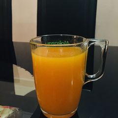 A picture of Mango and carrot juice.