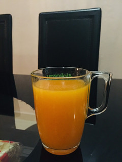 A picture of Mango and carrot juice.