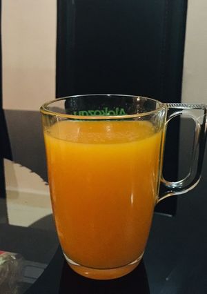 A picture of Mango and carrot juice.
