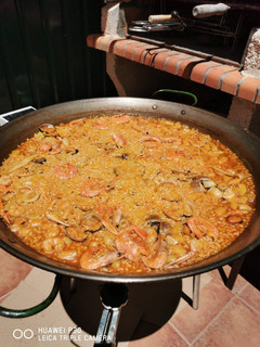 Una foto de Paella de marisco