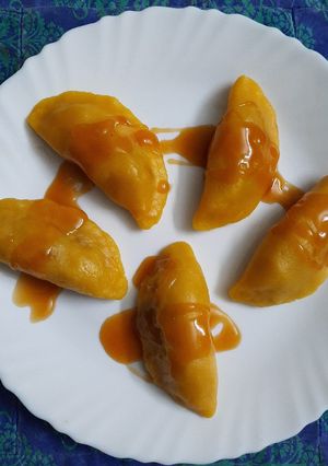 A picture of Palm dumplings stuffed with sweetened coconut.