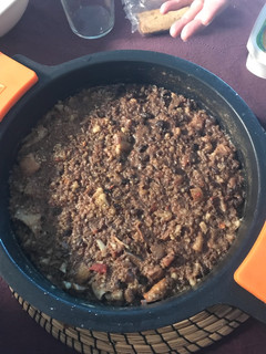 Una foto de Quinoa de ropa vieja, coliflor, costillas y morcilla