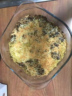 Una foto de Espaguetis con champiñones y queso
