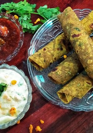 A picture of Methi Thepla with boondi Raita and Sweet Mango pickle.