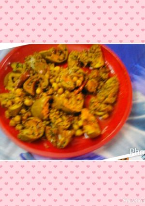 A picture of Raw mango pickle with chickpeas.