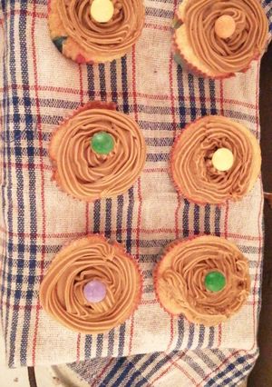Una foto de Cupcakes con frosting de café
