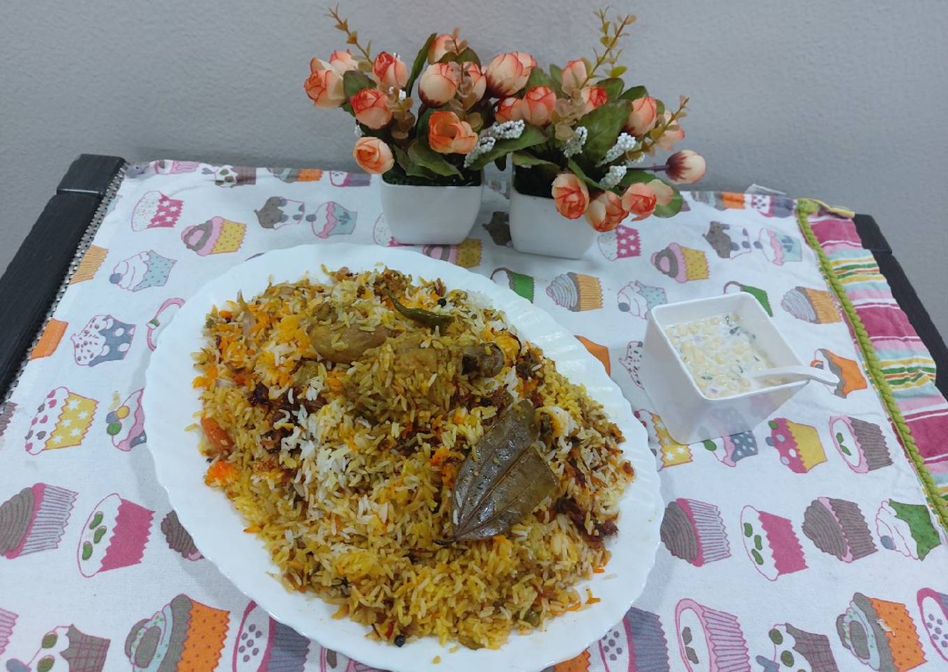 Masaledar chatpatyChicken biryani with boondi raita